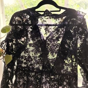 H&M black long sleeve sheer top. Size 8
